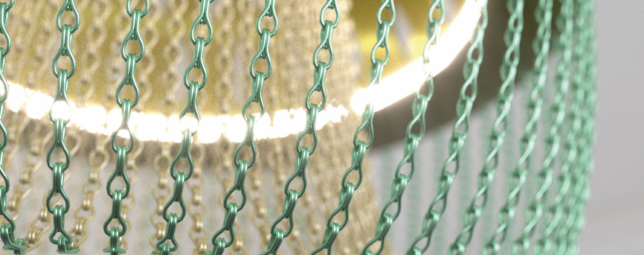 The chains of the EOS Slim up close: green stained aluminium chains in front of the lit porcelain rim