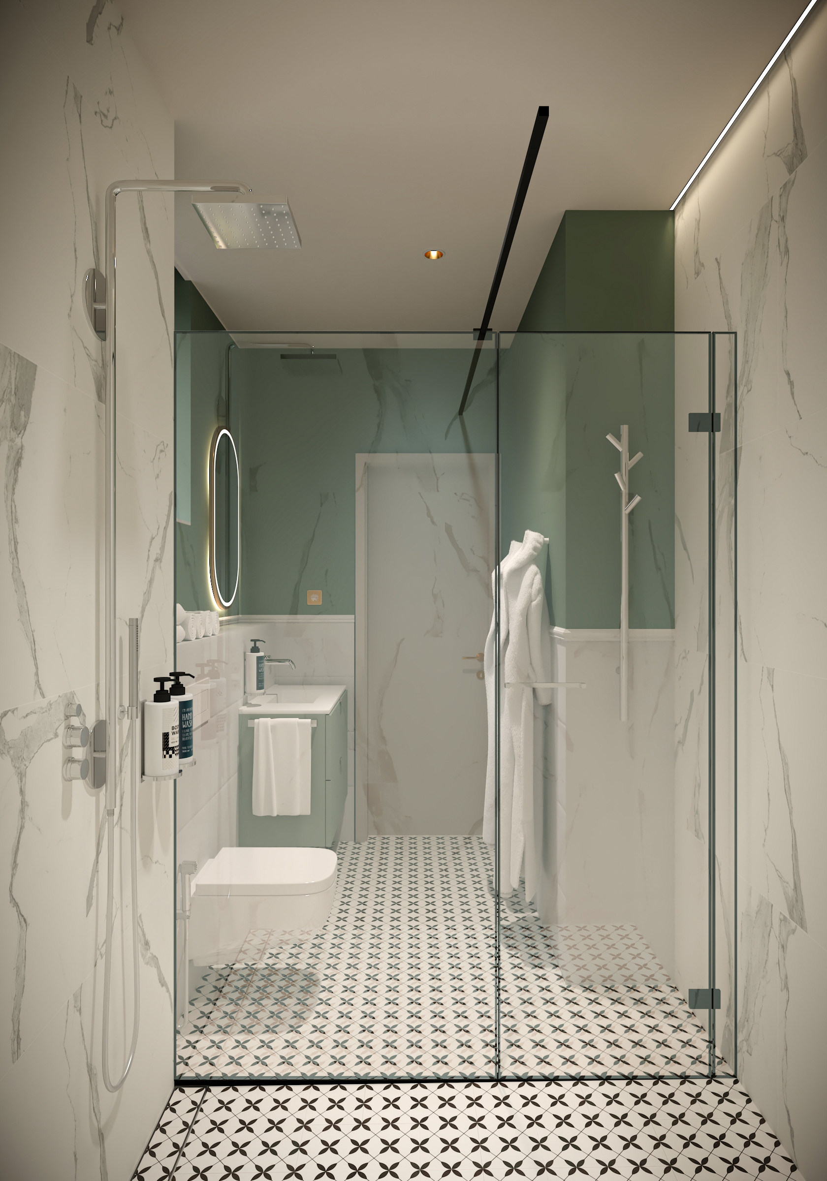 Glass-walled shower in marble-effect tiling, with a green-walled vanity area and a backlit oval mirror beyond