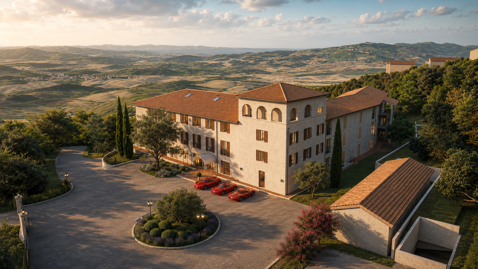 Arrival façade at sunset: lime plaster, clay tiles, a turning circle, three red sports cars at the entrance